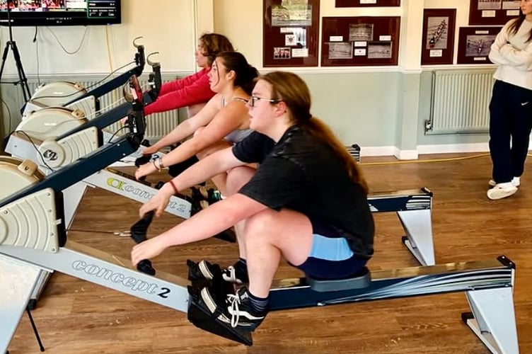 Monmouth Comprehensive School rowers put their backs into it in the 24-hour indoor rowing  marathon