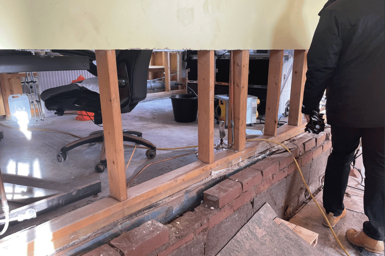 Tradesmen helping Monmouth Day Nursery after Storm Claudia flooding