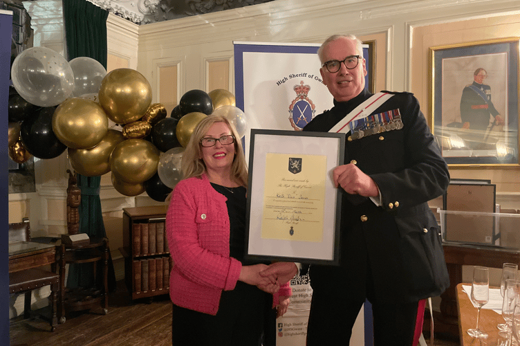 Keith Davies' wife collected his award at the High Sheriff of Gwent Awards in Monmouth 