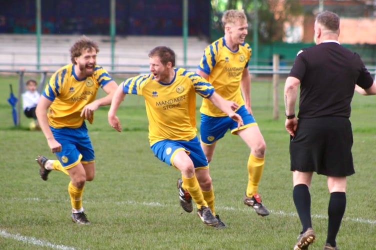 Players celebrate Luke Cleaves' leveller