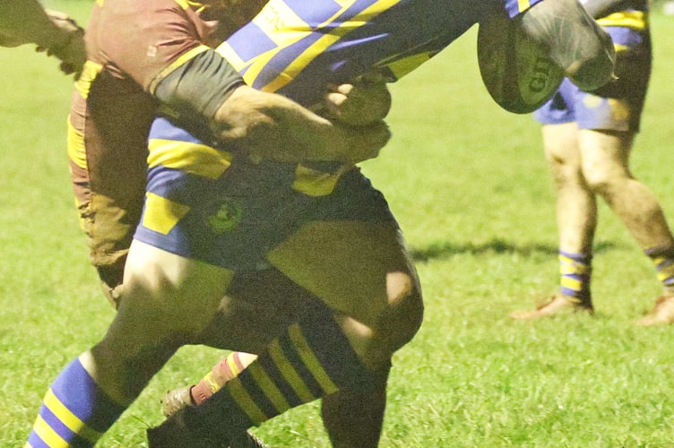 Jordan Howells stretches to score