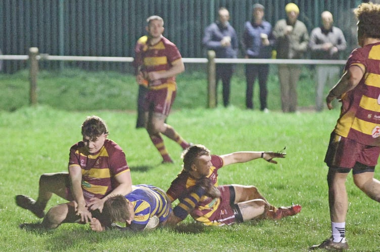 Oliver Scriven crosses for Monmouth's opening score