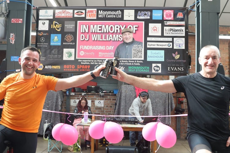 Chris Morgan and Andrew Howells celebrate completing their 112 mile challenge