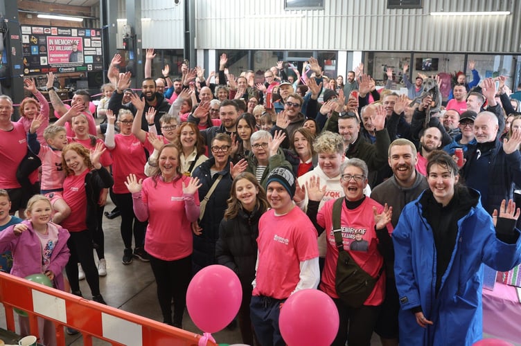 Volunteers and supporters gather to commemorate DJ