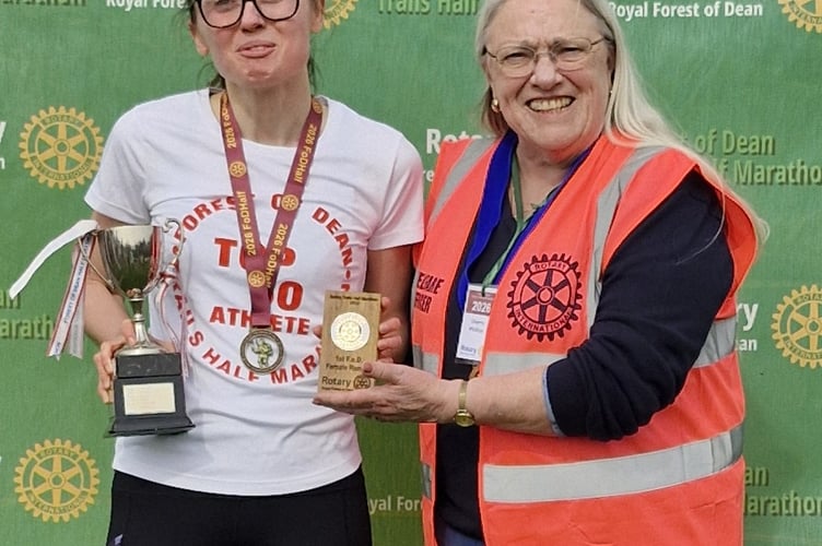 Madelaine Wheatstone was presented with her award as the first Forest woman to finish by former Rotary president Sherry Philips.