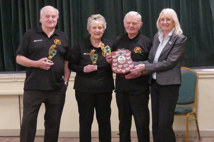  Winners Caerwent receive their trophies from League Chair, Philomena Vaughan: L-R Dai Williams, Sue Price, Neil Price.