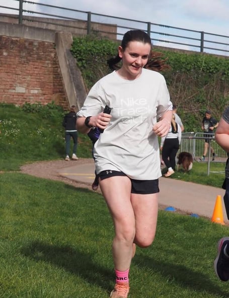 Elsie Wright running in the Chippenham Fields parkrun