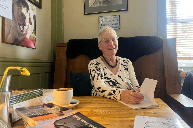 Carole Smith signing her new book 'Flying Solo' 
