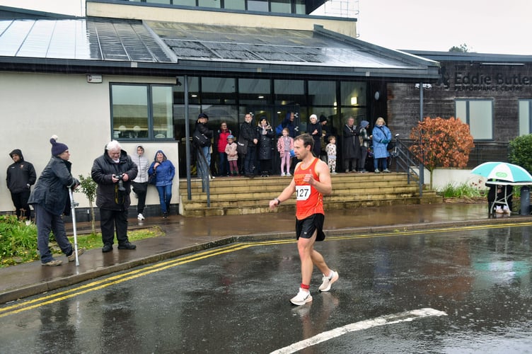 Rain welcomes runners back