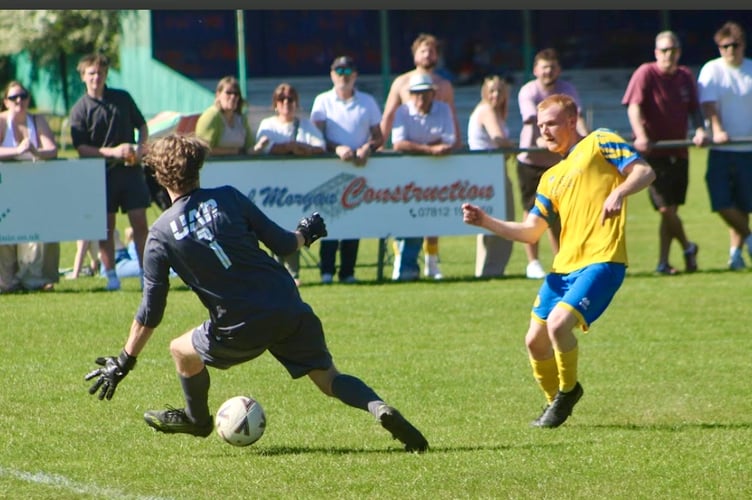 Jacob Perrella makes it 4-1 for Monmouth Town