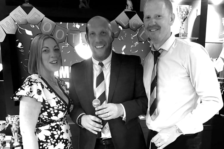 Claire and Paul Sullivan flank Rob Laurie