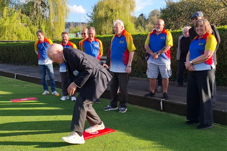 Monmouth Bowls Club President, Chris Bastin, delivers the first bowl to declare the green open. Photo: Haydn Holder 