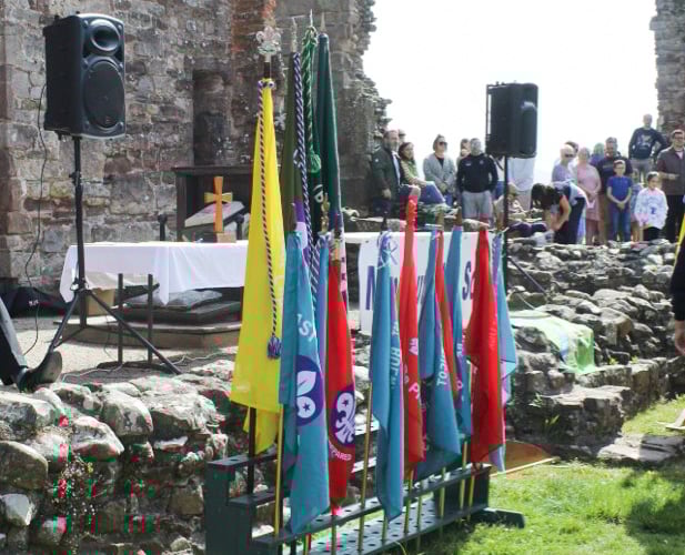 Flags of the various groups attending the service