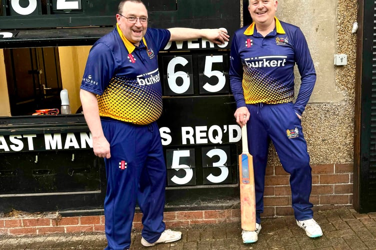 Monmouth CC club treasurer and 3rds player Nick Holt (right) celebrates a career-best 65 with club chairman Mike Maguire