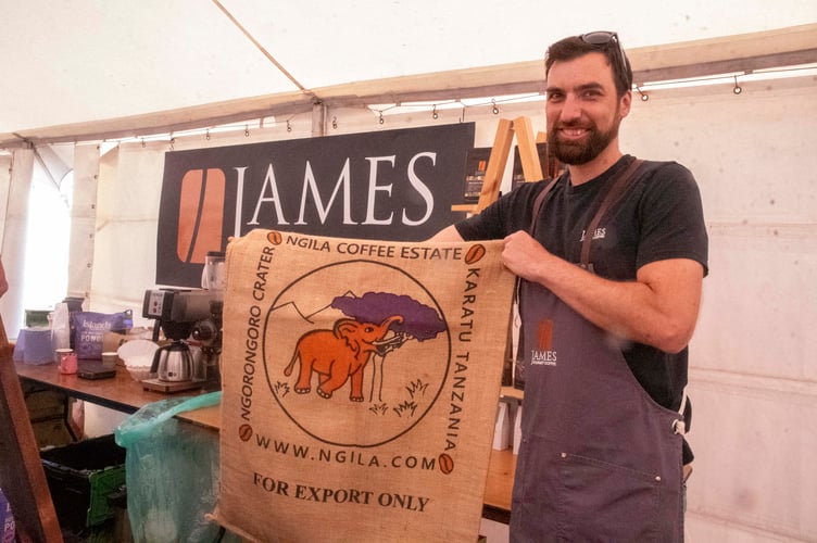 Ollie Pool, head roaster at James's Coffee, with one of the colourful coffee sacks being sold in aid of the Horizon Centre in Ross.