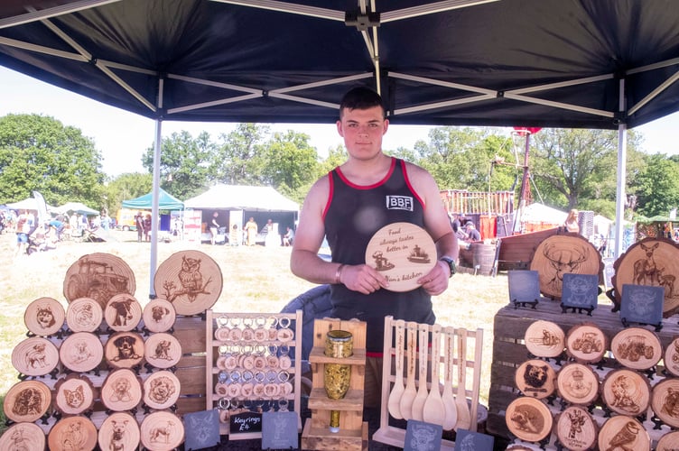 Wood craftsman Adam Fewtrell of Broadwell with some of his creations.