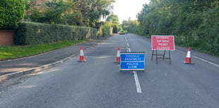 Car overturned after hitting an electricity pole