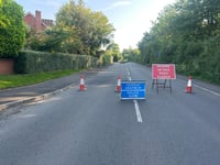 Car overturned after hitting an electricity pole