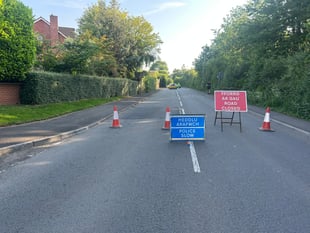 Car overturned after hitting an electricity pole