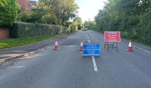 Car overturned after hitting an electricity pole