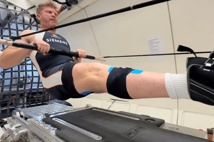 Matt Wells rowing in zero gravity. Photo John Kendrick