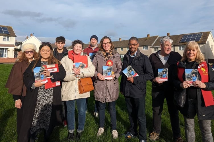 Sue Riley (third from left in white coat) standing next to Monmouthshire Labour MP Catherine Fookes and former Labour First Minister Vaughan Gething. 