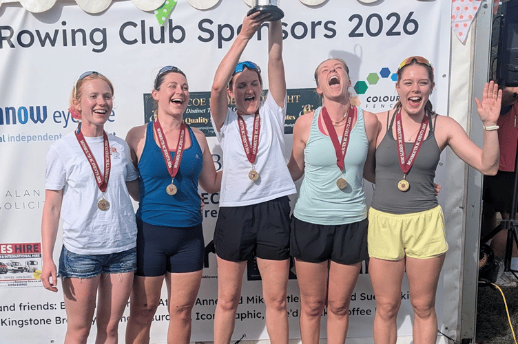 A crew celebrates victory at Monmouth Regatta