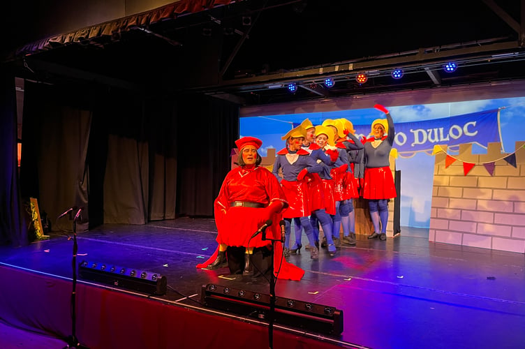 Lord Farquaad (Edward Preece) with the dancers.