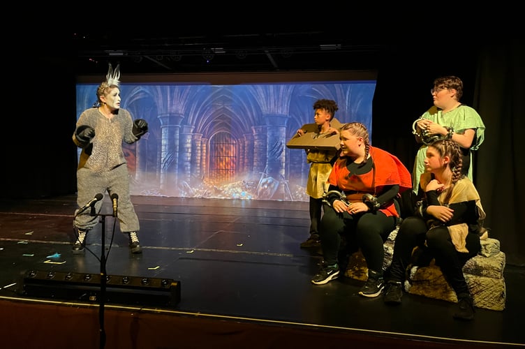 Donkey (Natasha Kus) with the knights who have failed in their quest to rescue the princess.