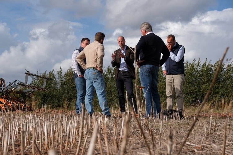 The Prince of Wales, in his role as the Duke of Cornwall, speaks with Regenified's Josh Fontenot and John Gregson during a visit Monkhall Farm in Hereford, to meet 25-year-old Harry Davies (left), the incoming tenant of the Duchy of Cornwall's first regenerative Farm Business Tenancy (rFBT). Picture date: Thursday October 1, 2026. PA Photo. Photo credit should read: Mathieu Willcocks/PA Wire 