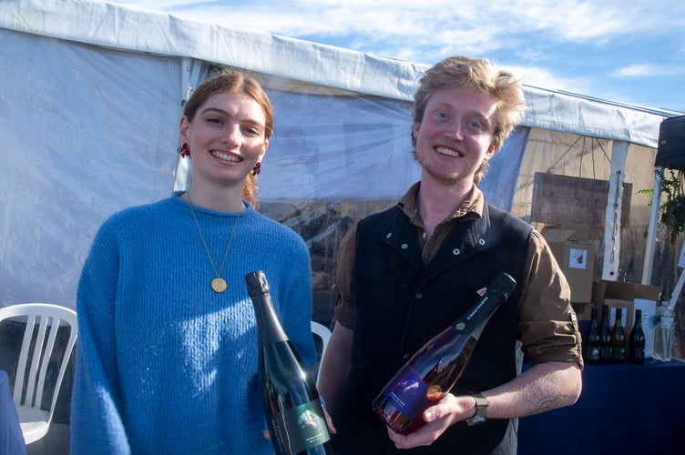 Lila Kellino-Miller and Jack Stone with award-winning wines from the Kingsthorne Vineyard at Flaxley.